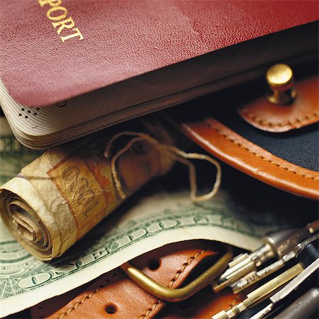 Passport, paper money, keys and bag, close-up Stock Photo - Premium Royalty-Free, Code: 695-05776606
