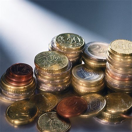 Several piles of assorted euro coins Stock Photo - Premium Royalty-Free, Code: 695-05776614