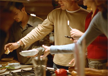 friends cooking inside - People together in kitchen Stock Photo - Premium Royalty-Free, Code: 695-05776638