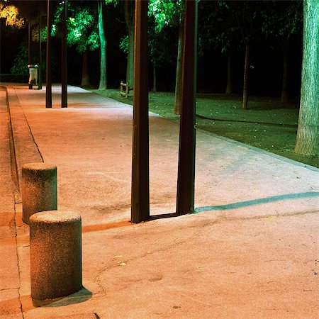 deserted city streets - Empty sidewalk at night Stock Photo - Premium Royalty-Free, Code: 695-05777087