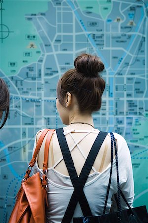 simsearch:695-05773315,k - Female looking at large map on wall, rear view Stock Photo - Premium Royalty-Free, Code: 695-05779614