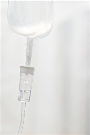 IV drip, close-up of drip chamber Stock Photo - Premium Royalty-Free, Code: 695-05770667