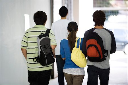 student back pack - Students walking together in corridor, rear view Stock Photo - Premium Royalty-Free, Code: 695-05770813