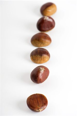 simsearch:614-05955760,k - Chestnuts lined up Stock Photo - Premium Royalty-Free, Code: 695-05771741