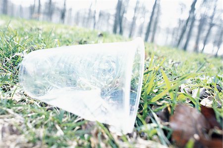 dirty environment - Plastic cup on grass Stock Photo - Premium Royalty-Free, Code: 695-05772177