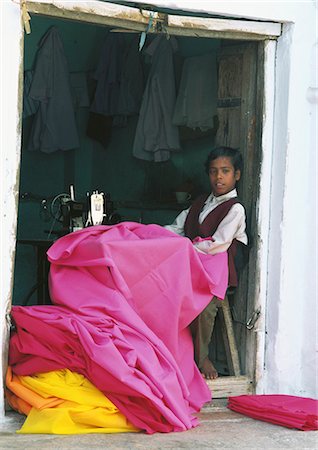 India, Pushkar, boy sewing Stock Photo - Premium Royalty-Free, Code: 695-05772500