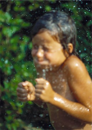 shower kid - Child getting wet Stock Photo - Premium Royalty-Free, Code: 695-05772537