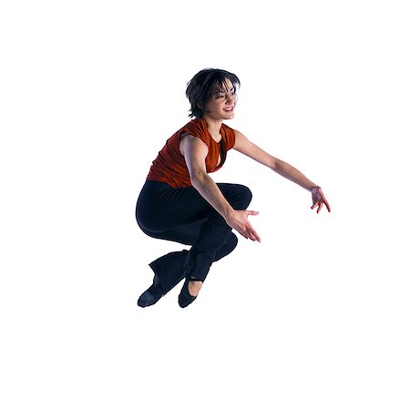 dynamic - Woman jumping Stock Photo - Premium Royalty-Free, Code: 695-05772610