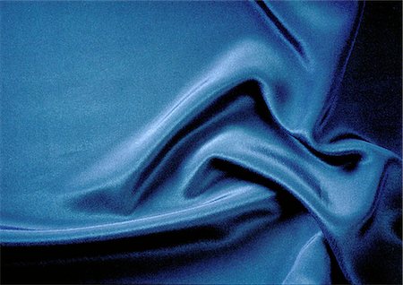 refine (to make more elegant) - Folds in silky blue fabric, close-up, full frame Stock Photo - Premium Royalty-Free, Code: 695-05772847