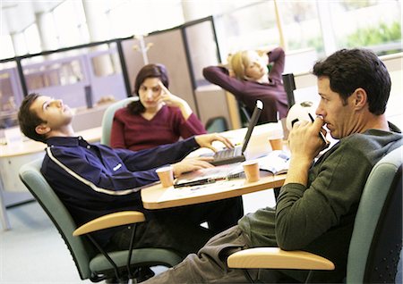 People sitting in office Stock Photo - Premium Royalty-Free, Code: 695-05773897