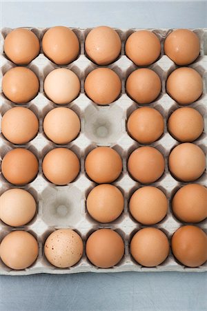 egg box - Fresh eggs in carton Stock Photo - Premium Royalty-Free, Code: 695-05780011