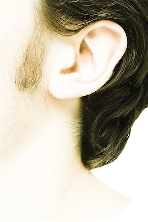 Young man's ear, extreme close-up Stock Photo - Premium Royalty-Free, Code: 695-03375620