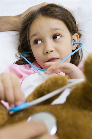 simsearch:695-05768235,k - Child holding toy stethoscope to teddy bear, talking to man Stock Photo - Premium Royalty-Free, Code: 695-03375856