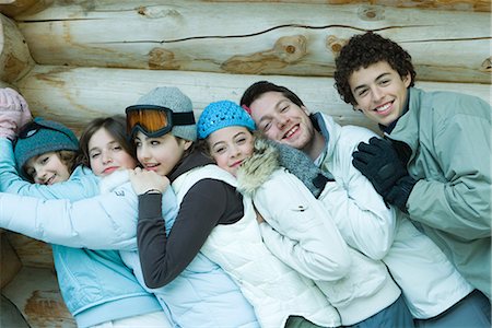 simsearch:695-03382482,k - Group in winter clothes, leaning against each other, waist up, portrait Stock Photo - Premium Royalty-Free, Code: 695-03376149