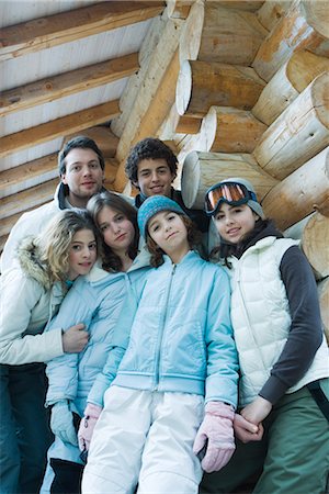 simsearch:695-03382482,k - Group portrait in winter clothes, three quarter length, low angle view Stock Photo - Premium Royalty-Free, Code: 695-03376150