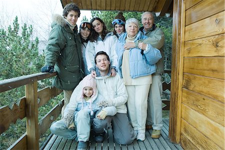 simsearch:696-03401677,k - Mixed age group standing on deck in snow, group portrait, full length Stock Photo - Premium Royalty-Free, Code: 695-03376152