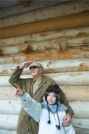 simsearch:695-03376367,k - Grandfather and grandson standing together, boy pointing, both looking up Stock Photo - Premium Royalty-Free, Code: 695-03376857