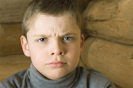 simsearch:695-03380694,k - Boy frowning at camera, portrait Stock Photo - Premium Royalty-Free, Code: 695-03377315