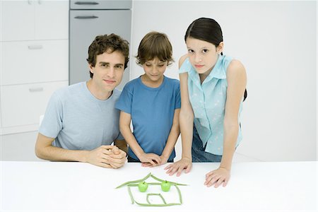 simsearch:695-03378605,k - Man with boy and girl in kitchen, with house made out of food Stock Photo - Premium Royalty-Free, Code: 695-03378904