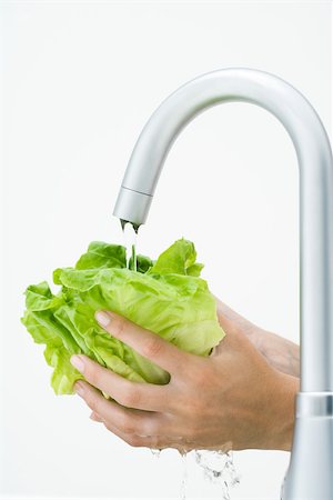 simsearch:632-05816631,k - Woman rinsing lettuce under faucet, cropped view of hands Stock Photo - Premium Royalty-Free, Code: 695-03379758