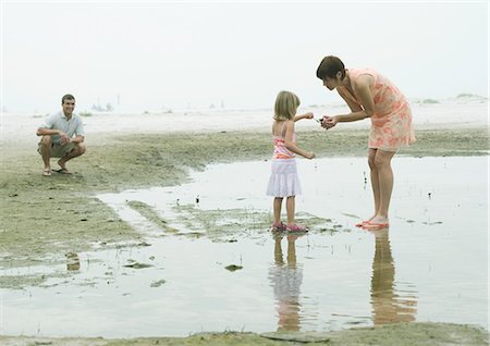 Family at the beach Stock Photo - Premium Royalty-Free, Code: 695-03373501