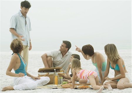 simsearch:6109-06003758,k - Group having picnic on beach Stock Photo - Premium Royalty-Free, Code: 695-03373502