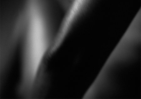 Woman's bare arm, blurred, close-up, B&W Stock Photo - Premium Royalty-Free, Code: 695-03384010