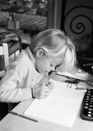 simsearch:695-03381153,k - Girl sitting at desk, writing in notebook, b&w Stock Photo - Premium Royalty-Free, Code: 695-03385069