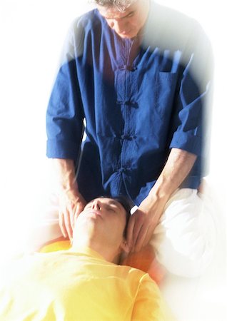 simsearch:649-06164622,k - Massage therapist massaging man's head Stock Photo - Premium Royalty-Free, Code: 695-03385782
