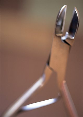 simsearch:696-03395895,k - Nail scissors, close-up Stock Photo - Premium Royalty-Free, Code: 695-03386726