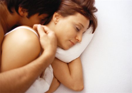 Man and woman in bed Stock Photo - Premium Royalty-Free, Code: 695-03386858