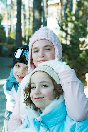 simsearch:695-03388794,k - Young friends in ski clothing, looking at camera Stock Photo - Premium Royalty-Free, Code: 695-03389275