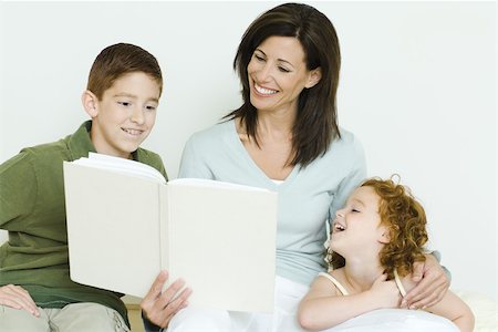 simsearch:695-05769087,k - Mother reading book to son and daughter Stock Photo - Premium Royalty-Free, Code: 695-03389667