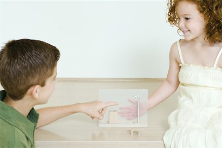 simsearch:632-03424261,k - Brother and sister playing together Stock Photo - Premium Royalty-Free, Code: 695-03389679