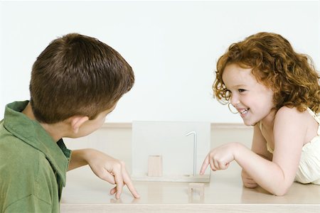 simsearch:632-03424261,k - Boy and little sister playing Stock Photo - Premium Royalty-Free, Code: 695-03389680