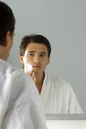simsearch:696-03395895,k - Man applying shaving cream, looking at self in mirror Stock Photo - Premium Royalty-Free, Code: 695-03380120
