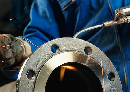 Worker welding, close-up Stock Photo - Premium Royalty-Free, Code: 695-03381534