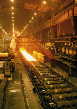 Molten steel in rolling mill, long shot Stock Photo - Premium Royalty-Free, Code: 695-03381562