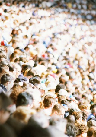 Crowd in stadium, high angle view, blurred Stock Photo - Premium Royalty-Free, Code: 695-03382239