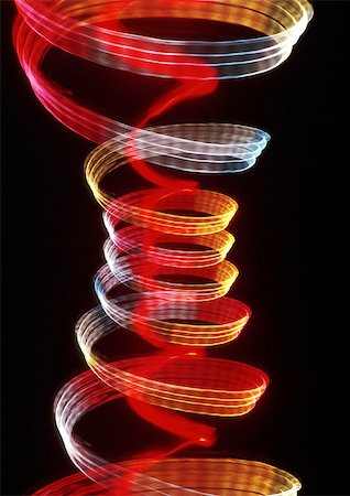 simsearch:695-03382978,k - Spiraling light effects, one within the other, reds and yellows. Stock Photo - Premium Royalty-Free, Code: 695-03382978