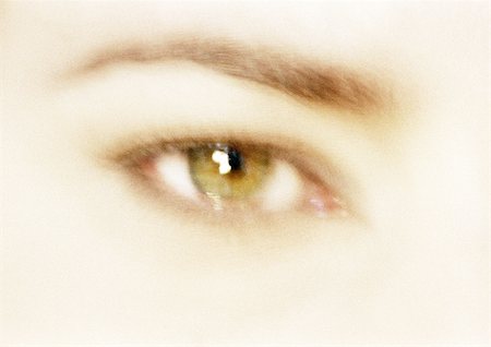 simsearch:400-04790516,k - Woman's hazel eye, front view, blurred close up. Stock Photo - Premium Royalty-Free, Code: 695-03383039