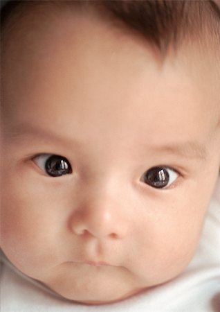 simsearch:632-03027302,k - Baby's face, close-up. Stock Photo - Premium Royalty-Free, Code: 695-03383361