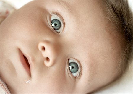 simsearch:632-03027302,k - Baby's face, looking at camera, close-up Stock Photo - Premium Royalty-Free, Code: 695-03383892