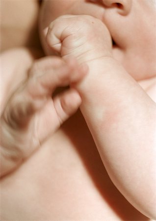 Baby sucking thumb, close-up Stock Photo - Premium Royalty-Free, Code: 695-03383901
