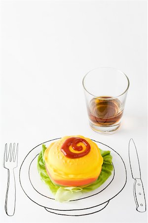 simsearch:700-01538773,k - Ketchup and plastic hamburger on drawing of plate, glass of whisky nearby Stock Photo - Premium Royalty-Free, Code: 695-03390163