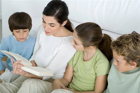 simsearch:695-03378605,k - Woman reading story to her children Stock Photo - Premium Royalty-Free, Code: 695-03390392