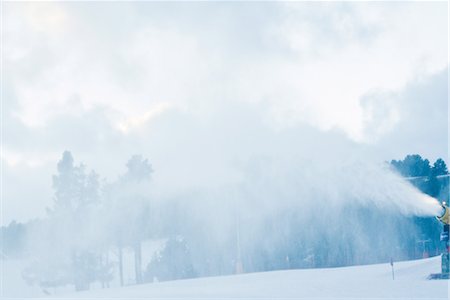 Snowblower on ski slope Stock Photo - Premium Royalty-Free, Code: 696-03394885