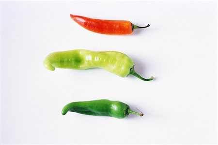 simsearch:628-02228100,k - Red, yellow and green peppers, close-up Stock Photo - Premium Royalty-Free, Code: 696-03395510
