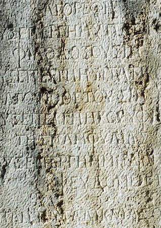 engrave - Ancient Greek manuscript engraved in stone. Stock Photo - Premium Royalty-Free, Code: 696-03396509