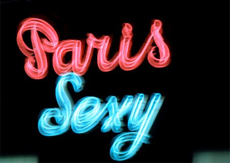 Sexy Paris enseignes au néon, floues. Photographie de stock - Premium Libres de Droits, Code: 696-03396537